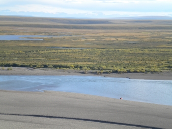 The Colville River drains the Brooks Range across the Arctic Coastal Plain and provides distinct source sediment to lagoons on the coast. Image courtesy of Andrea Jo Miller, University of Texas.