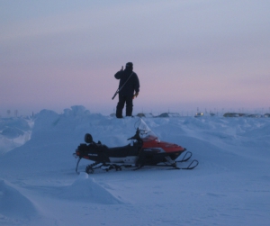 A UIC Science bear guard stands watch over a research site on the Chukchi sea ice. Photo courtesy of UIC Science.