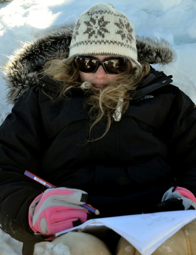 Diligent note taking on the ice (Photo Credit: Lynn Foshee Reed)