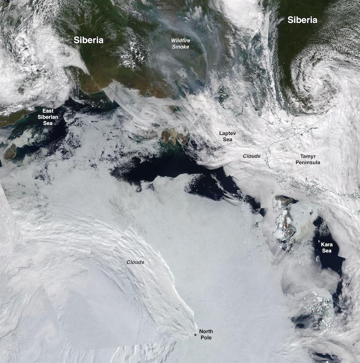 Figure 9. This true-color composite of sea ice conditions along the Siberian coast, from Moderate Resolution Imaging Spectroradiometer (MODIS) sensor on the NASA Terra satellite on 12 July 2020. Also visible is the smoke from wildfires surging in Siberia. Credit: NASA Worldview.