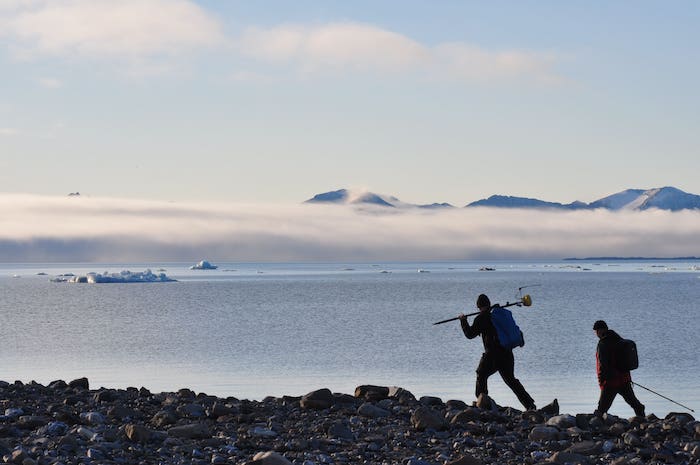 Figure 1. Research scientists in the field on Svalbard, Norway. Photo courtesy of K. Greń.