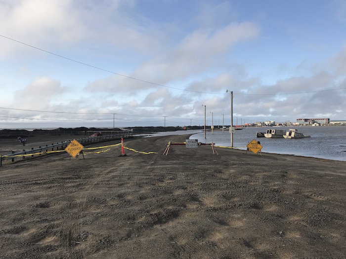 Figure 5.  Photo from Utqiagvik, Alaska in early August 2019 during a strong westerly storm that caused flooding and closure of Eben Hopson Street one of the primary roads in the community. Photo courtesy of Benjamin Jones.