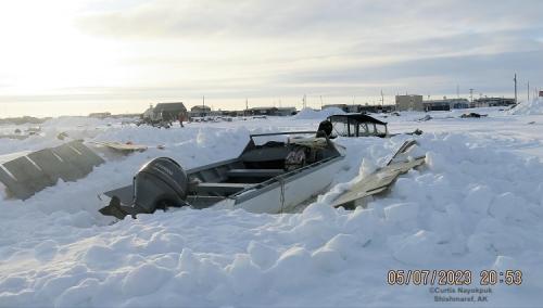 Hunters digging out boats and prepping gear in Shimaref. Photos courtesy of Curtis Nayokpuk.