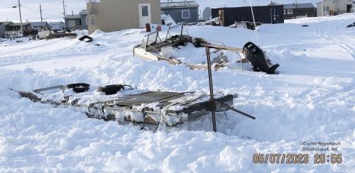 Hunters digging out boats and prepping gear in Shimaref. Photos courtesy of Curtis Nayokpuk.