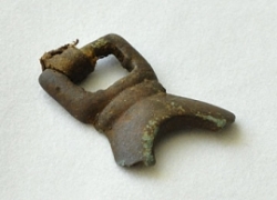 Cast metal buckle recovered from Cape Espenberg, Alaska