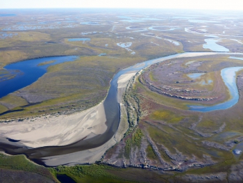 Figure 2. The Fish Creek (Iqalliqpik in Inupiaq) Watershed is land mosaicked by rivers, streams, lakes, and wetlands that provide important subsistence resources for Alaska Native communities and water resources for petroleum exploration and development.  Photo courtesy of Chris Arp.