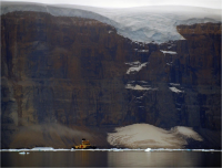 The Swedish Icebreaker Oden cruises the Petermann Fjord in northeast Greenland. Photo courtesy of the Petermann Expedition.