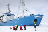  IASC facilitates international and interdisciplinary connections for Arctic science. Students pictured above are  moored to an ice-flow next to the Norwegian Polar Institute's RV Lance. Photo courtesy of Lawrence Hislop, Norwegian Polar Institute.