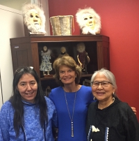 Scholars, Rosemary Ahtuanguarak (left) and Theresa Arevgaq John (right) meeting with Senator Lisa Murkowksi in her office. Photo courtesy of Robert Rich.