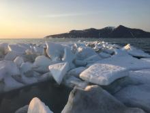 Remnants of sea ice off Cape Mountain in Bering Strait, 27 May 2016 (Photo: Amos Oxeorok).