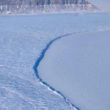 Calving front of Petermann Glacier. Photo courtesy of James Yungel. Calving front of Petermann Glacier