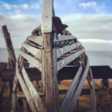 A boat frame along the shoreline in Savoonga.
