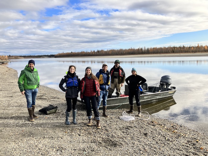 Figure 1. SILT Team, left to right, Tamlin Pavelsky, Lilian Cooper, Julianne Davis, Ted Langhorst, Allen Bondurant, and Katie Spellman; getting ready for pre-freeze-up installations of  optical backscatter sensors (OBS) to measure turbidity on the Tanana River in early October 2023. Photo courtesy of Emily Eidam.